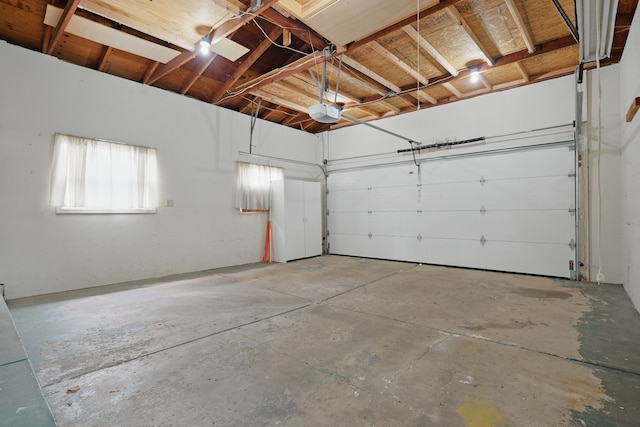 1451 Peachwood Dr, Flint, MI 48507 - garage featuring a garage door opener