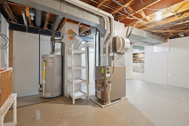 1451 Peachwood Dr, Flint, MI 48507 - unfinished basement featuring gas water heater and heating unit