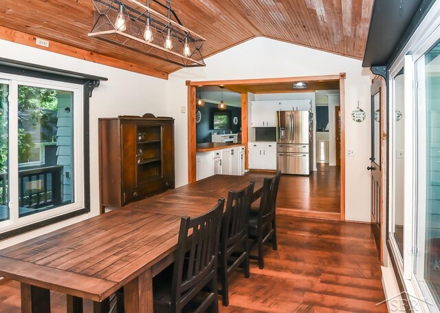 1466 Wilson Ave, Saginaw, MI 48638 - dining area with wooden ceiling, vaulted ceiling, and dark wood finished floors