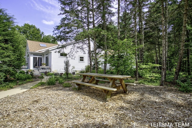 12993 144th Ave, Grand Haven, MI 49417 - view of property exterior featuring a shingled roof