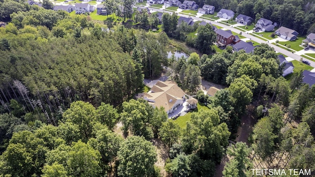 12993 144th Ave, Grand Haven, MI 49417 - aerial view of property's location featuring nearby suburban area and a heavily wooded area