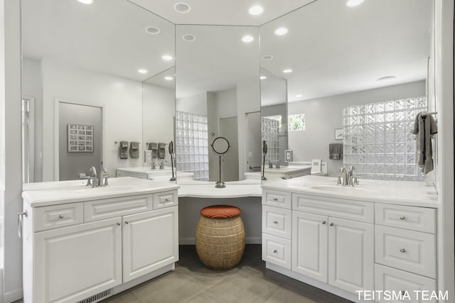 12993 144th Ave, Grand Haven, MI 49417 - full bath with two vanities and recessed lighting