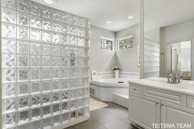 12993 144th Ave, Grand Haven, MI 49417 - full bath featuring tile patterned flooring, a bath, and vanity
