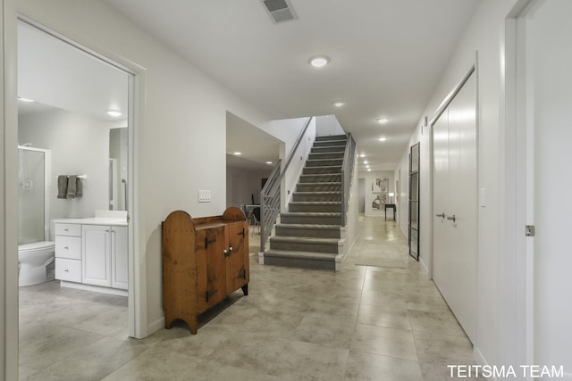 12993 144th Ave, Grand Haven, MI 49417 - hall with recessed lighting, stairs, and baseboards