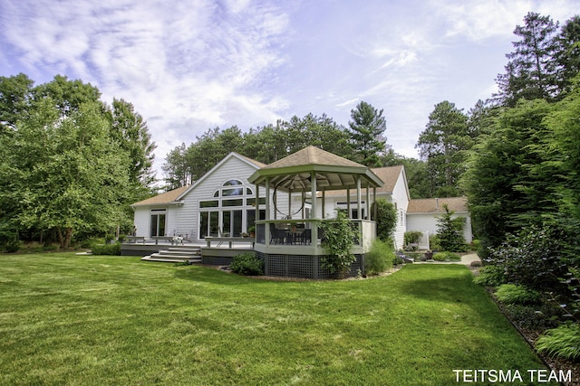 12993 144th Ave, Grand Haven, MI 49417 - rear view of property featuring a gazebo, a yard, a wooden deck, and a shingled roof