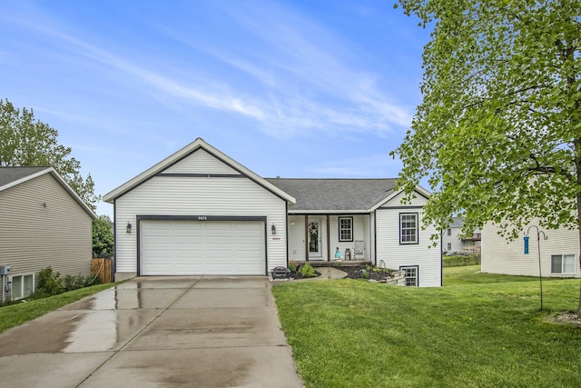 3076 Daybreak Ln, Holland, MI 49424 - ranch-style home featuring a front lawn, an attached garage, concrete driveway, and roof with shingles