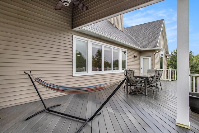 7522 S 10th St, Kalamazoo, MI 49009 - wooden deck featuring outdoor dining area and ceiling fan