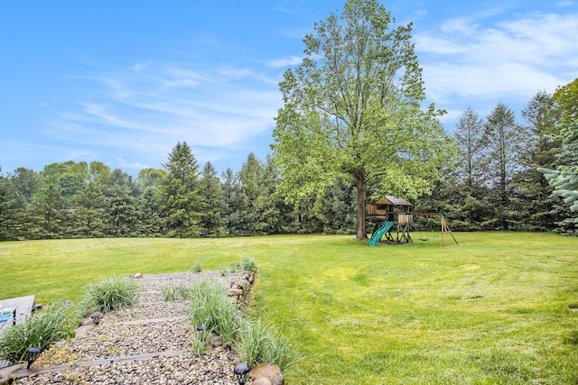 7522 S 10th St, Kalamazoo, MI 49009 - view of green lawn with a playground