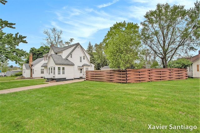 429 Van Allen St SE, Wyoming, MI 49548 - view of side of property with a chimney