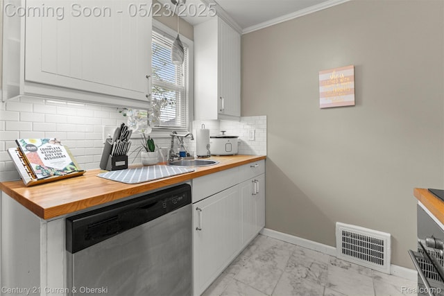 3346 Westpoint St, Dearborn, MI 48124 - kitchen with dishwasher, wooden counters, a sink, ornamental molding, and light marble finish floors