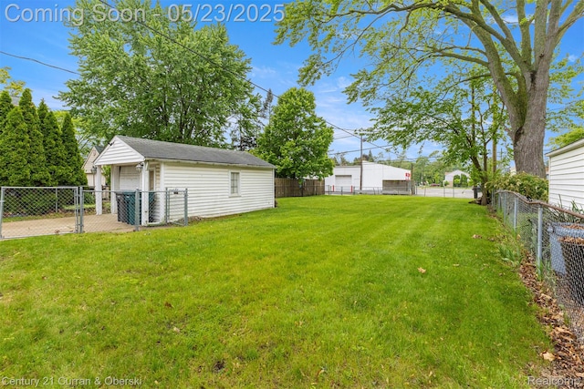 3346 Westpoint St, Dearborn, MI 48124 - view of yard with a detached garage and an outdoor structure
