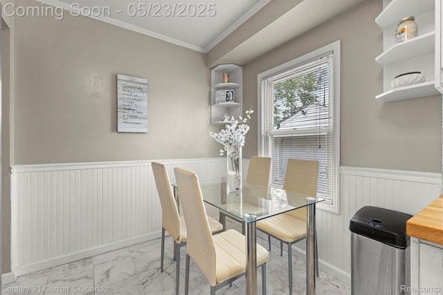 3346 Westpoint St, Dearborn, MI 48124 - dining space with marble look tile flooring, ornamental molding, and wainscoting