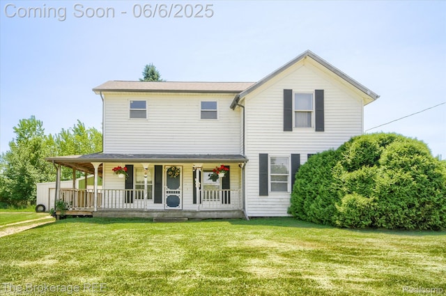 8114 Wilson Rd, Otisville, MI 48463 - view of front of home featuring a porch and a front yard