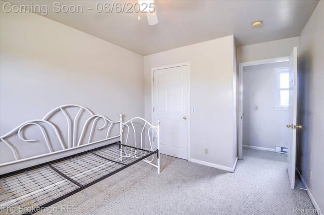 8114 Wilson Rd, Otisville, MI 48463 - carpeted bedroom with baseboards and ceiling fan