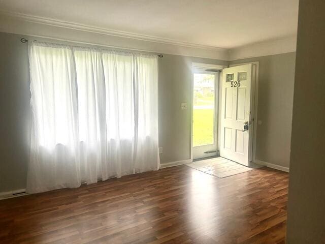 526 18th St, Jackson, MI 49203 - unfurnished room featuring crown molding and wood finished floors