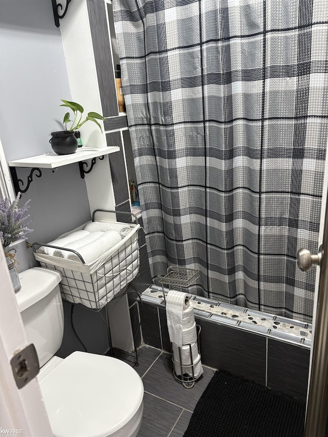 37 Killdeer Ct, Lapeer, MI 48446 - full bath featuring toilet, tile patterned flooring, and shower / bathtub combination with curtain