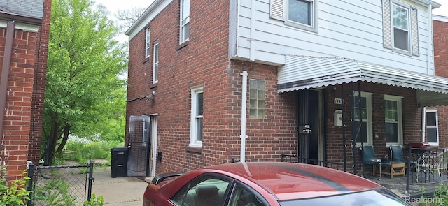 14931 Rossini Dr, Detroit, MI 48205 - view of side of home featuring brick siding
