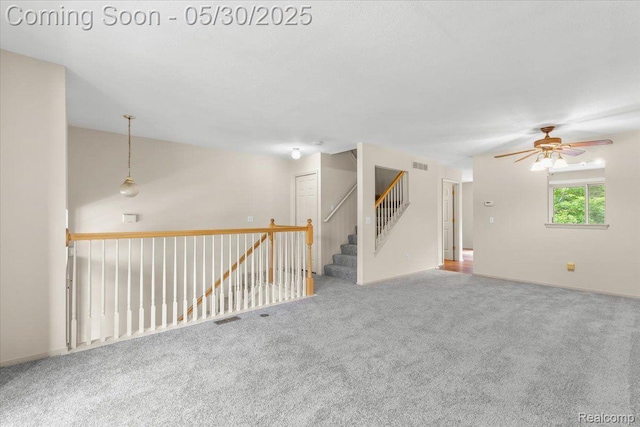 6680 Central City Pkwy, Westland, MI 48185 - carpeted empty room featuring a ceiling fan and baseboards