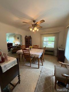 18598 Henry St, Melvindale, MI 48122 - dining area featuring a ceiling fan and arched walkways