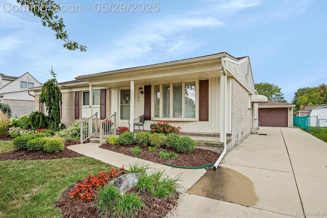 22540 Devonshire St, Woodhaven, MI 48183 - ranch-style house featuring an outdoor structure, covered porch, a garage, and brick siding