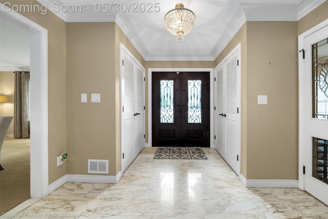 4462 Barchester Dr, Bloomfield Hills, MI 48302 - entryway with marble tiled floors, baseboards, a chandelier, and ornamental molding