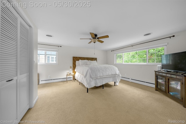 4462 Barchester Dr, Bloomfield Hills, MI 48302 - bedroom featuring baseboard heating, light carpet, a ceiling fan, and a closet