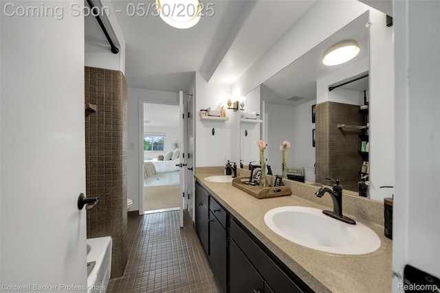 4462 Barchester Dr, Bloomfield Hills, MI 48302 - ensuite bathroom featuring double vanity, tile patterned floors, a shower, and toilet