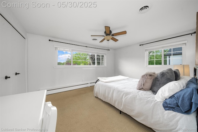 4462 Barchester Dr, Bloomfield Hills, MI 48302 - bedroom featuring baseboard heating, a closet, carpet floors, and ceiling fan