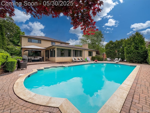 4462 Barchester Dr, Bloomfield Hills, MI 48302 - view of swimming pool with an outdoor hangout area, a patio, a sunroom, grilling area, and a diving board