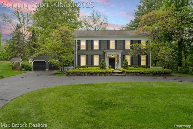 27160 Scenic, Franklin, MI 48025 - view of front of property with a yard, driveway, and an outdoor structure