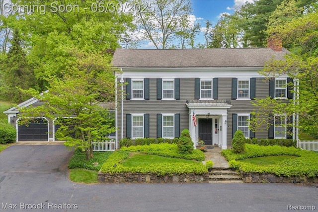 27160 Scenic, Franklin, MI 48025 - view of front of house with a chimney and a garage