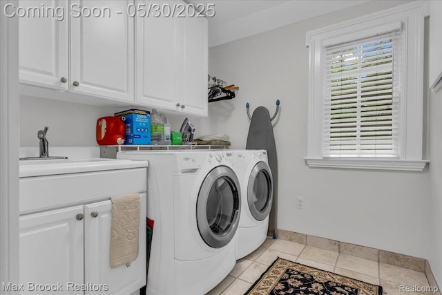 27160 Scenic, Franklin, MI 48025 - laundry room featuring cabinet space, washer and dryer, baseboards, and light tile patterned flooring