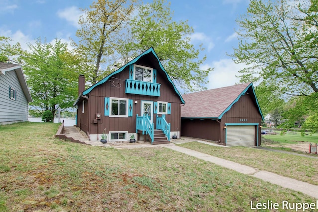 6221 Honeymoon Dr, Lakeview, MI 48850 - view of front of property with a chimney, an outdoor structure, and a front lawn