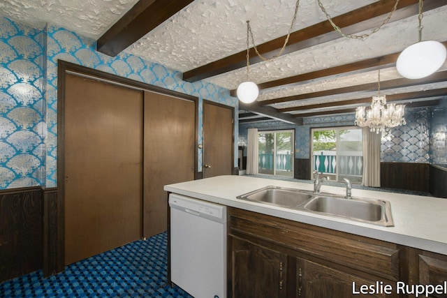 6221 Honeymoon Dr, Lakeview, MI 48850 - kitchen with white dishwasher, a sink, wallpapered walls, light countertops, and beam ceiling