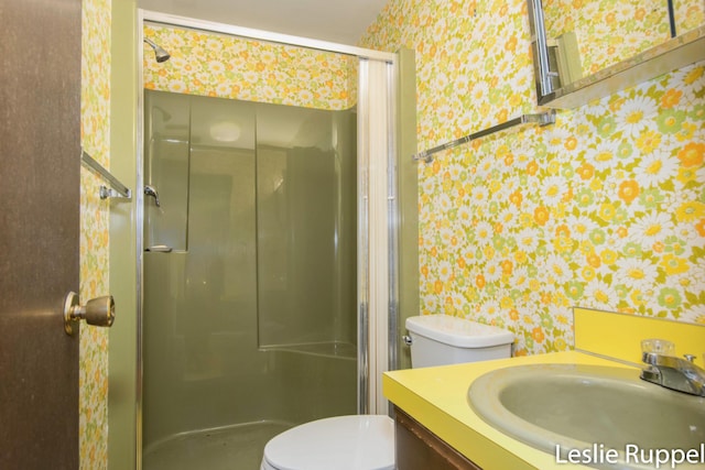 6221 Honeymoon Dr, Lakeview, MI 48850 - full bath featuring wallpapered walls, toilet, a shower stall, and vanity