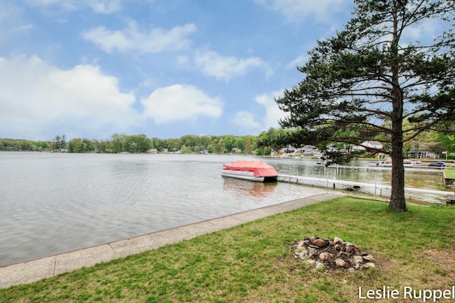 6221 Honeymoon Dr, Lakeview, MI 48850 - dock area featuring a water view and a lawn