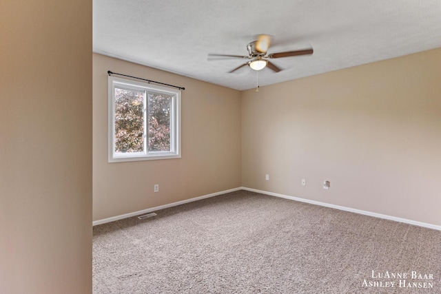 7300 Orchard View Dr NE, Rockford, MI 49341 - carpeted spare room with a ceiling fan and baseboards
