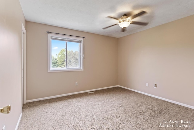 7300 Orchard View Dr NE, Rockford, MI 49341 - carpeted spare room featuring ceiling fan and baseboards