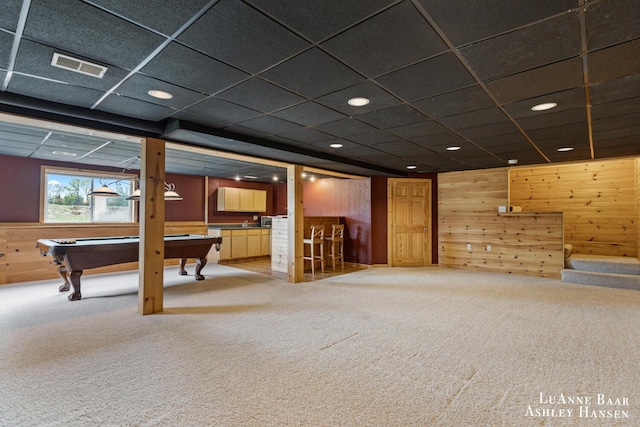 7300 Orchard View Dr NE, Rockford, MI 49341 - basement with carpet, wood walls, pool table, a paneled ceiling, and recessed lighting