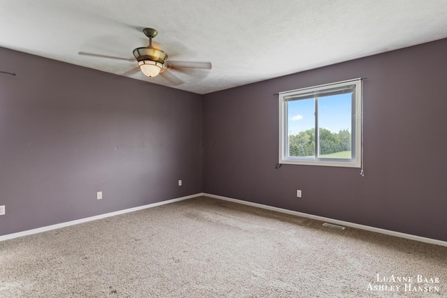 7300 Orchard View Dr NE, Rockford, MI 49341 - carpeted empty room featuring a ceiling fan and baseboards