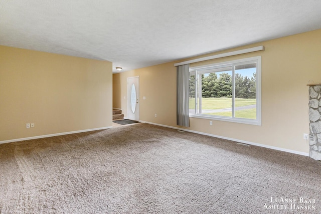 7300 Orchard View Dr NE, Rockford, MI 49341 - empty room featuring carpet and baseboards
