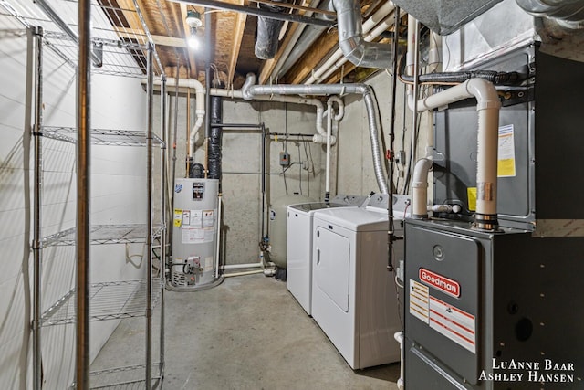 7300 Orchard View Dr NE, Rockford, MI 49341 - utility room featuring gas water heater and washing machine and clothes dryer