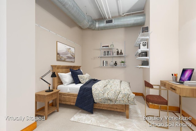 600 Broadway Ave NW Unit 414, Grand Rapids, MI 49504 - bedroom with carpet floors