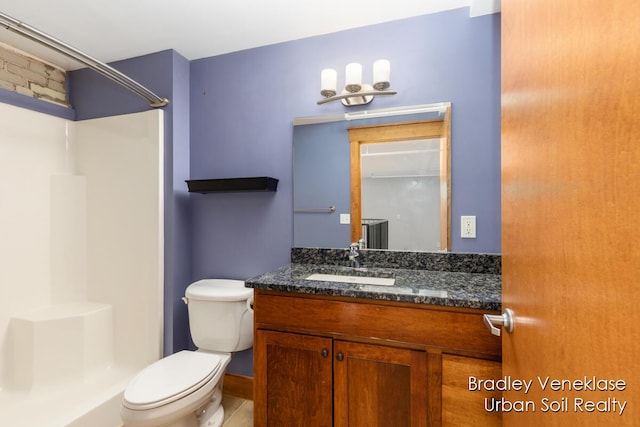 600 Broadway Ave NW Unit 414, Grand Rapids, MI 49504 - full bathroom with a shower, toilet, and vanity