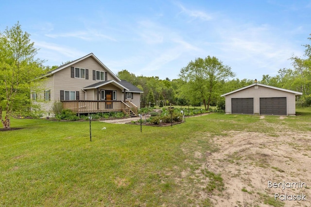 5826 W 124th St, Grant, MI 49327 - view of green lawn featuring a garage, a deck, and an outdoor structure