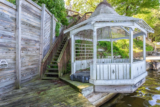 18957 N Fruitport Rd, Spring Lake, MI 49456 - wooden deck featuring stairs and a gazebo