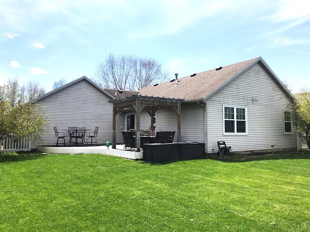 5883 Thistlewood Ave, Scotts, MI 49088 - back of property featuring a pergola, a yard, and roof with shingles