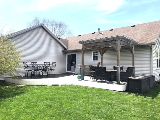 5883 Thistlewood Ave, Scotts, MI 49088 - rear view of property with a shingled roof, a pergola, a yard, a patio, and an outdoor hangout area