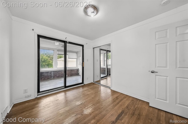 26730 W Davison, Redford, MI 48239 - unfurnished room featuring wood finished floors, healthy amount of natural light, a smoke detector, and ornamental molding