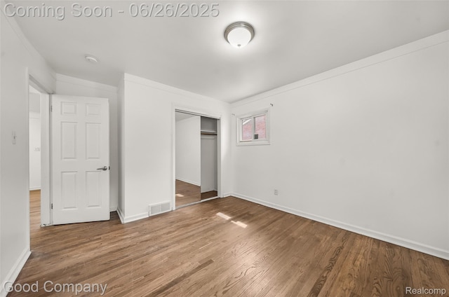 26730 W Davison, Redford, MI 48239 - unfurnished bedroom featuring a closet and wood finished floors